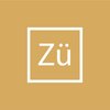 Zü Design & Architecture Intérieure, carré blanc sur fond ocre avec lettrage minimaliste.