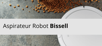Aspirateur robot Bissell en action sur un sol avec des miettes, nettoyage efficace automatique