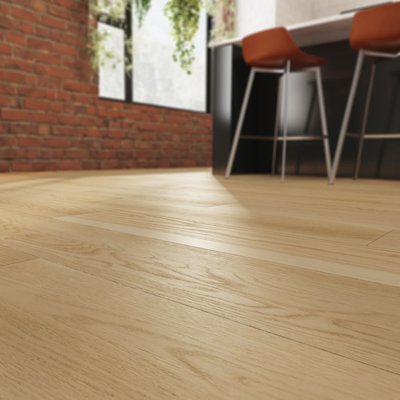 Plancher en vinyle effet chêne blanc dans une cuisine moderne avec mur de briques, vendu chez Flordeco au Québec