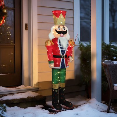 Casse-noisette lumineux de Noël coloré, décorant l'entrée d'une maison enneigée - Wayfair