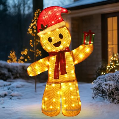 Décoration lumineuse de Noël représentant un bonhomme pain d'épices souriant avec un bonnet de Noël, une écharpe rouge et un petit cadeau vert dans une main - Wayfair