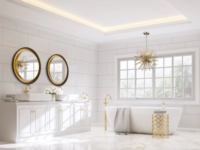 Miroir illuminé Reflections AM304 de chez Brick – Salle de bain luxueuse avec deux miroirs ronds à bordure dorée, baignoire autoportante blanche et accents dorés créant une ambiance moderne et élégante.