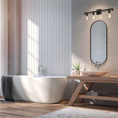 Salle de bain moderne avec baignoire autoportante, meuble-lavabo en bois naturel et applique murale noire de style industriel à quatre ampoules de chez Luminaires & Cie exposées au-dessus d’un miroir ovale