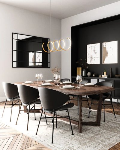 Suspension linéaire dorée Synergy avec spirale lumineuse de chez Luminaires & Cie, suspendue au-dessus d'une grande table à manger en bois rustique, entourée de chaises noires au design contemporain dans une salle à manger moderne et élégante