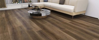 Salon moderne avec plancher vinyle Zina de Fuzion Flooring, canapé d'angle crème et table basse contemporaine.