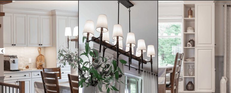 Cuisine lumineuse au style classique avec armoires blanches, suspensions modernes, coin repas en bois foncé et étagères décoratives près de la fenêtre signé Caroline Bennett Design