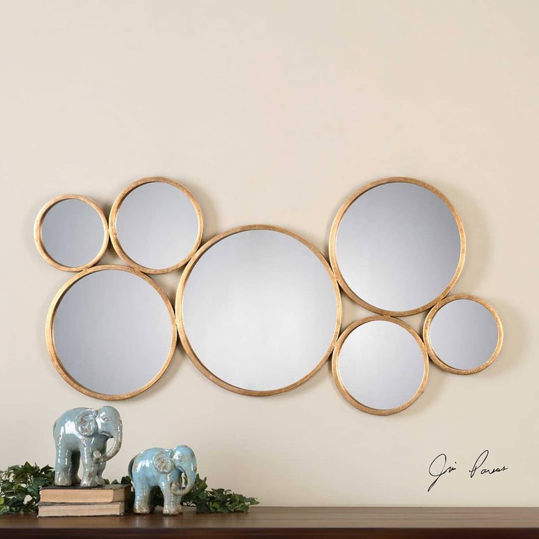 Miroir mural décoratif chez Ô Miroir au Québec Miroir mural décoratif composé de plusieurs cercles à cadres dorés, design moderne pour salon ou entrée, disponible chez Ô Miroir au Québec